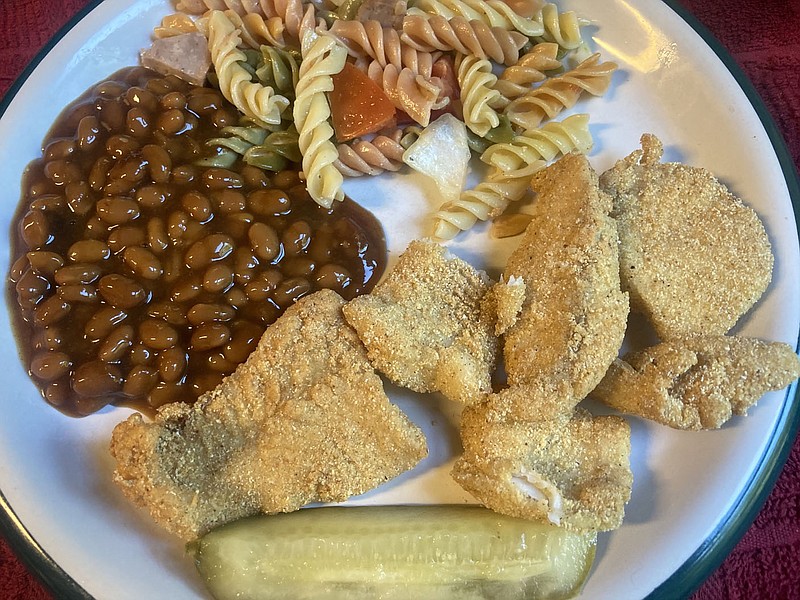 Deep frying is a favorite way to cook fish, such as these crappie filets. Proper oil temperature, around 350 degrees, is key to a tasty fish dinner.
(NWA Democrat-Gazette/Flip Putthoff)