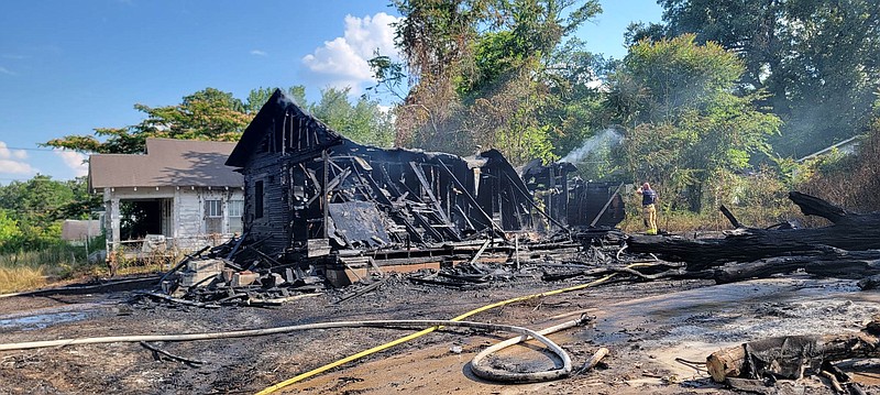 Photo By: Michael Hanich
The remains of a house on Pearl Street destroyed by a fire on Thursday, June 1st.