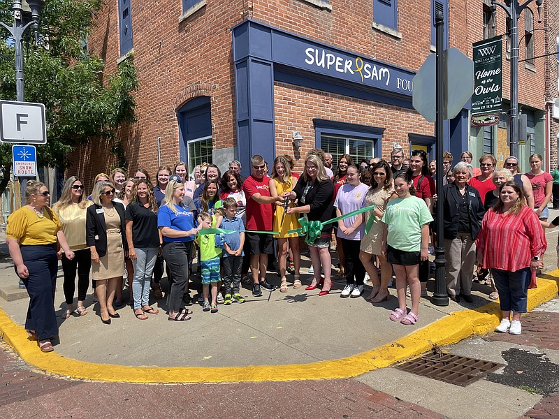 Andrea Merritt/Fulton Sun
The Super Sam Foundation cuts a ribbon in front of its new building on June 2.