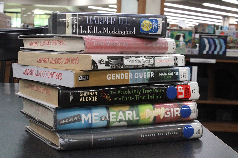 A stack of commonly challenged books is shown at the Garland County Library. - Photo by Lance Porter of The Sentinel-Record