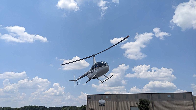Sky Tours takes to the air to tour areas of Hot Springs, including Lake Hamilton, the Ouachita River and the national park. – Photo by Courtney Edwards of The Sentinel-Record