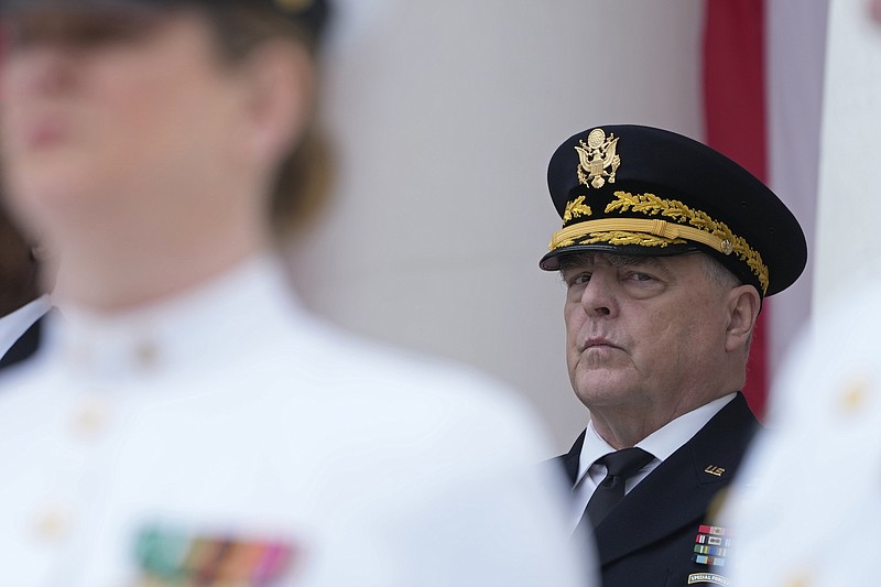 FILE - Chairman of the Joint Chiefs of Staff Gen. Mark Milley listens during an event at the Memorial Amphitheater of Arlington National Cemetery in Arlington, Va., on Memorial Day, on May 29, 2023. The chairman of the Joint Chiefs of Staff, Gen. Mark Milley, says the main battle tanks and fighter jets the U.S. has promised to Ukraine wont be ready in time for the imminent counteroffensive against Russia. Tank warfare will be key to Ukraine pushing Russia out of its territory, and the U.S. has begun training Ukrainian troops on M1A1 Abrams battle tank tactics. (AP Photo/Susan Walsh, File)