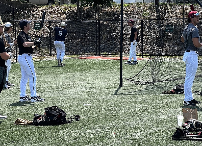 Natural State Collegiate League players taking batting practice Friday at Majestic Park. League play began Friday for the second season. - Photo by Bryan Rice of The Sentinel-Record