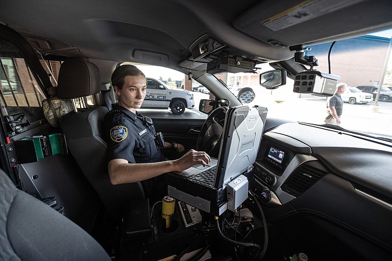 Bentonville officer Alyssa Tidwell gets ready to go on patrol Friday, June 2, 2023, at the Bentonville police department. Entry level police officers will see a pay increase starting in July as the city tries to remain competitive salary wise.
(NWA Democrat-Gazette/Spencer Tirey)