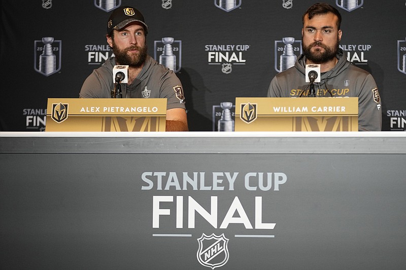 Vegas Golden Knights defenseman Alex Pietrangelo, left, and left wing William Carrier speak to the media during an NHL hockey news conference, Sunday, June 4, 2023, in Las Vegas. (AP Photo/Abbie Parr)