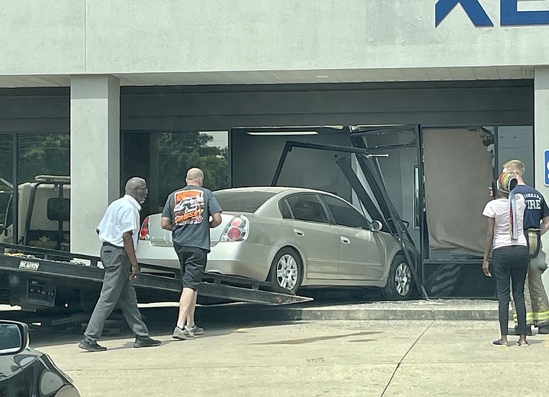 A woman inside a business was injured Monday morning, June 5, 2023 after an elderly woman accidentally drove into the front of a building at 4303 Texas Boulevard. The 89-year-old driver hit the gas instead of the brakes, according to Texarkana, Texas Police. A woman inside the building was taken to the hospital with minor injuries. The driver was not injured. (photo provided by Texarkana Texas Police Department.)