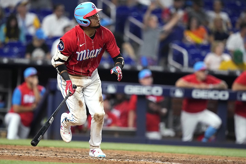 Miami Marlins' Luis Arraez watches his double during the seventh inning of a baseball game against the Oakland Athletics, Saturday, June 3, 2023, in Miami. (AP Photo/Lynne Sladky)