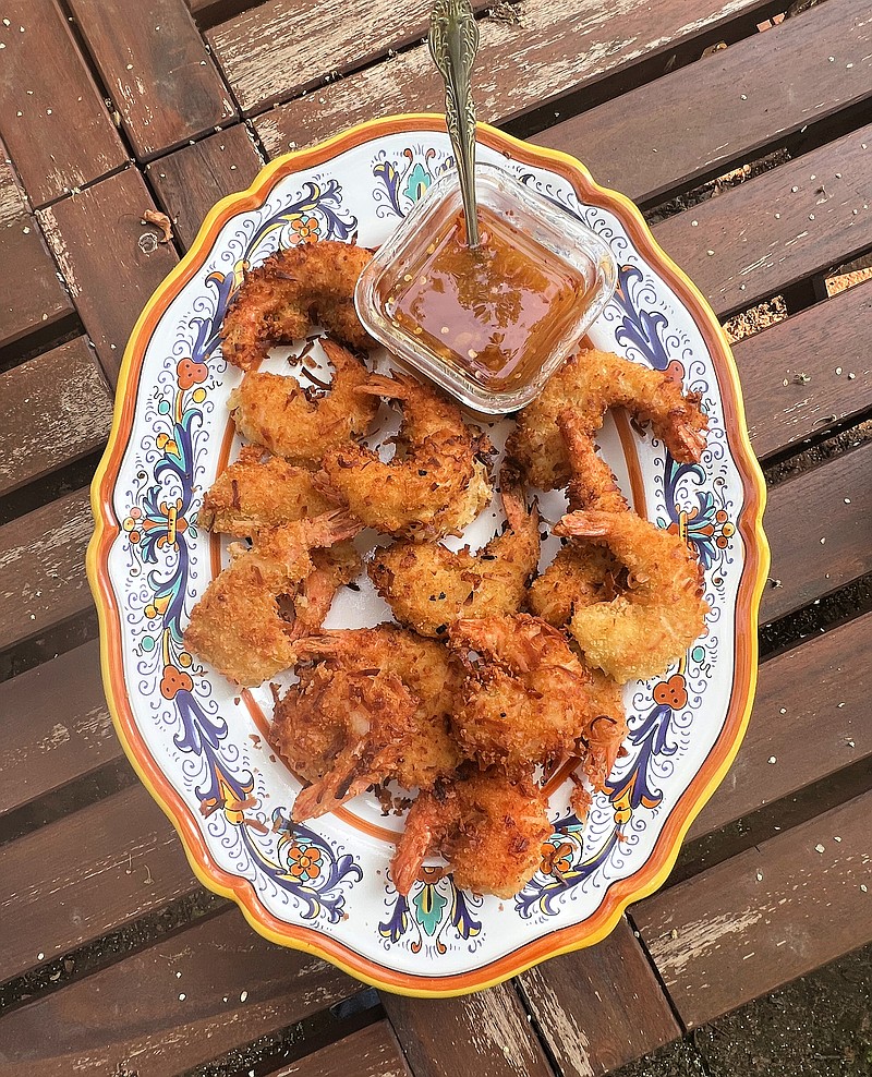 Golden, sweet and crispy, coconut shrimp is a favorite party finger good. (Gretchen McKay/Pittsburgh Post-Gazette/TNS)