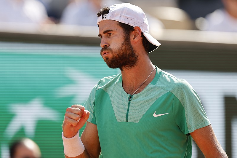 Russia's Karen Khachanov clenches his fist after scoring a point against Serbia's Novak Djokovic during their quarterfinal match of the French Open tennis tournament at the Roland Garros stadium in Paris, Tuesday, June 6, 2023. (AP Photo/Jean-Francois Badias)