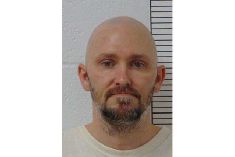 This booking photo provided by the Missouri Department of Corrections shows Michael Tisius. Tisius is scheduled to die by injection Tuesday evening, June 6, 2023, at the state prison in Bonne Terre, Mo., for killing Leon Egley and Jason Acton at the Randolph County Jail in the early hours of June 22, 2000, in an ill-fated effort to help an inmate escape. (Missouri Department of Corrections via AP)