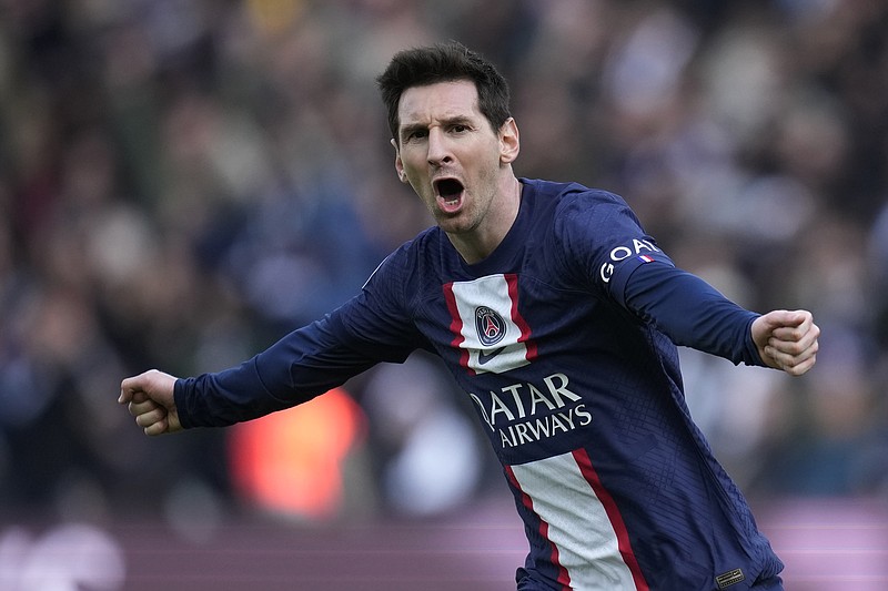 FILE - PSG's Lionel Messi celebrates after scoring his side's fourth goal during the French League One soccer match between Paris Saint-Germain and Lille at the Parc des Princes stadium, in Paris, France, Sunday, Feb. 19, 2023. Lionel Messi says he is coming to Inter Miami and joining Major League Soccer. After months of speculation, Messi announced his decision Wednesday, June 7, 2023,to join a Miami franchise that has been led by another global soccer icon in David Beckham since its inception but has yet to make any real splashes on the field. (AP Photo/Christophe Ena, File)