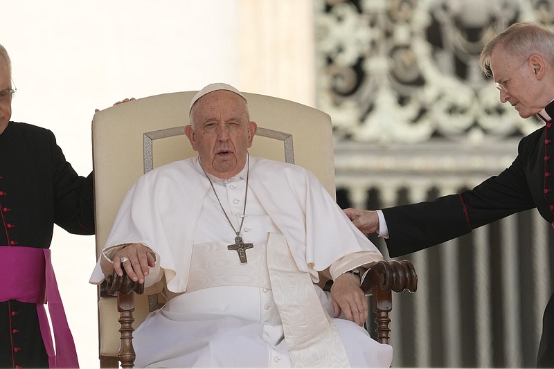 Pope Francis attends his weekly general audience in St. Peter's Square at The Vatican, Wednesday, June 7, 2023. During the period between the end of one pontificate and the election of a new pope the camerlengo, or chamberlain, runs the administration and finances of the Holy See, but under canon law Pope Francis was still pope, fully in charge of running the Vatican and the 1.3-billion-strong Catholic Church, even while unconscious and undergoing surgery Wednesday, June 7, 2023, to repair a hernia in his abdominal wall. (AP Photo/Andrew Medichini)