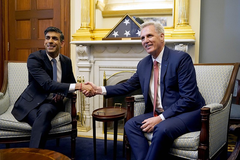 Britain's Prime Minister Rishi Sunak, left, shakes hands with US House Speaker Kevin McCarthy during a meeting at Capitol Hill for round table discussions with ranking members of House and Senate committees and small number of individual meetings, during his visit to Washington D.C., Wednesday, June 7, 2023. The war in Ukraine was top Sunaks agenda Wednesday as he started a two-day trip to Washington carrying the message that post-Brexit Britain remains an essential American ally in a world of emboldened authoritarian states.  (Niall Carson/Pool Photo via AP)