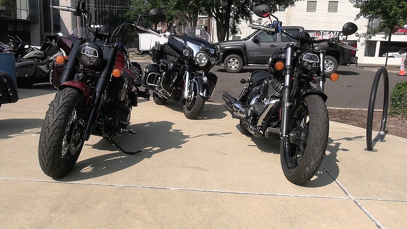 Several motorcycles were set up Thursday morning in the Bridge Street Entertainment District as the annual Bike Fest kicked off. Harley-Davidson and Indian bikes are available for demo today and Saturday at the event. - Photo by Lance Porter of The Sentinel-Record