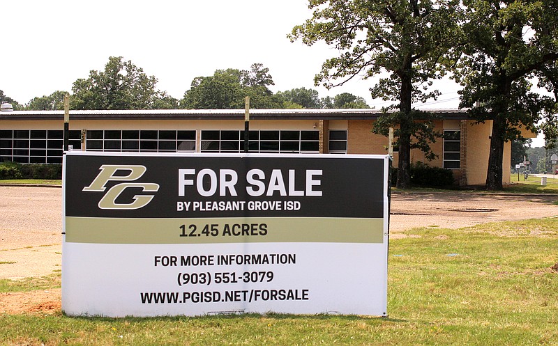 A for-sale sign faces traffic on the Richmond Road side of Pleasant Grove Elementary School on Thursday, June 8, 2023, in Texarkana, Texas. The district plans to open bids on the 12-plus-acre property within a month. (Staff photo by Stevon Gamble)