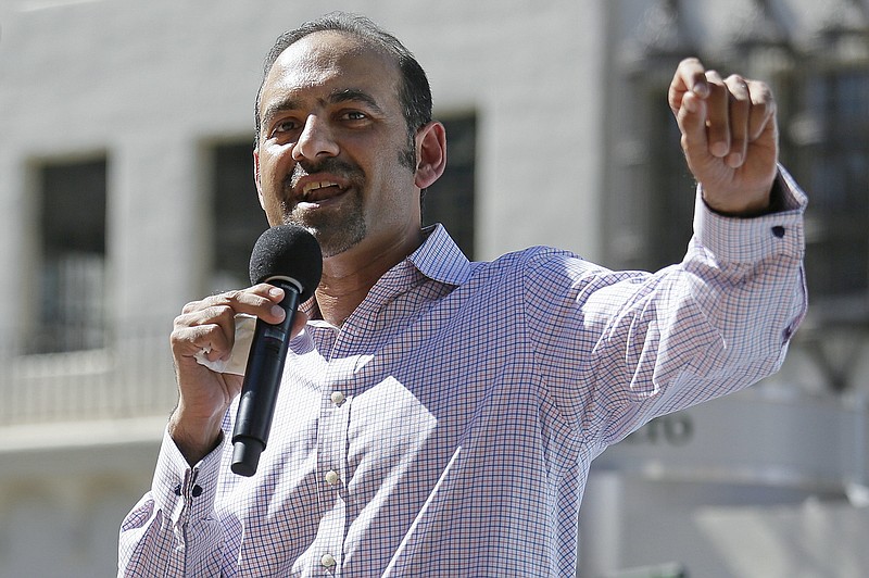 FILE - Dilawar Syed, president of the software company Freshdesk, speaks during a Tech Stands Up rally outside City Hall in Palo Alto, Calif., March 14, 2017. The Senate has confirmed the highest-ranking Muslim official in the U.S. government. Dilawar Syed was confirmed Thursday, June 8, 2023, as deputy administrator of the Small Business Administration in a 52-42 vote. (AP Photo/Eric Risberg, File)