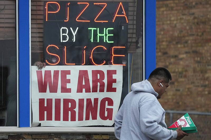 Economy Jobs Report
A hiring sign is displayed at a restaurant in Prospect Heights, Ill., Tuesday, April 4, 2023. On Friday, the U.S. government issues the March jobs report. (AP Photo/Nam Y. Huh)