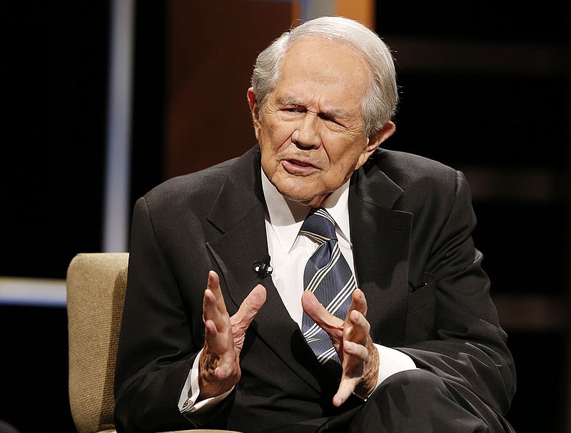 Rev. Pat Robertson gestures as he poses a question to Republican presidential candidate former Florida Gov. Jeb Bush during a Presidential candidate forum in October 2015 at Regent University in Virginia Beach, Va.
(AP/Steve Helber)