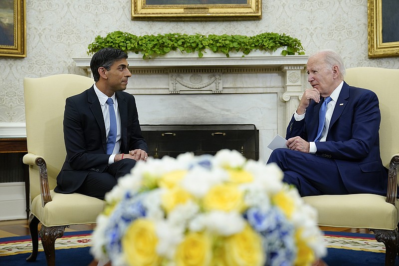 Prime Minister Rishi Sunak poses with Washington Nationals mascot Screech,  as he attends the Washington Nationals v Arizona Diamondbacks baseball at  Nationals Park during his visit to Washington DC in the US.