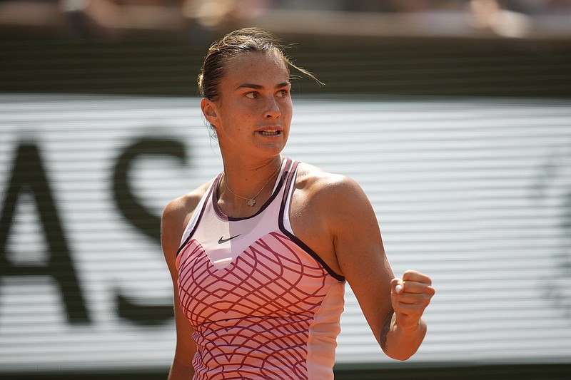 Aryna Sabalenka of Belarus clenches her fist after scoring a point against Karolina Muchova of the Czech Republic during their semifinal match of the French Open tennis tournament at the Roland Garros stadium in Paris, Thursday, June 8, 2023. (AP Photo/Christophe Ena)