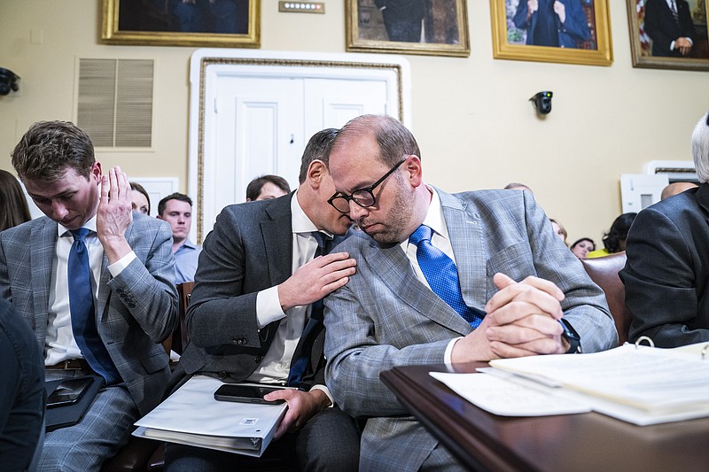 House Ways and Means Committee Chairman Jason T. Smith (R-Mo.), right, speaks with an aide during a House Rules Committee hearing on Capitol Hill on May 30, 2023, in Washington, D.C. MUST CREDIT: Washington Post photo by Jabin Botsford