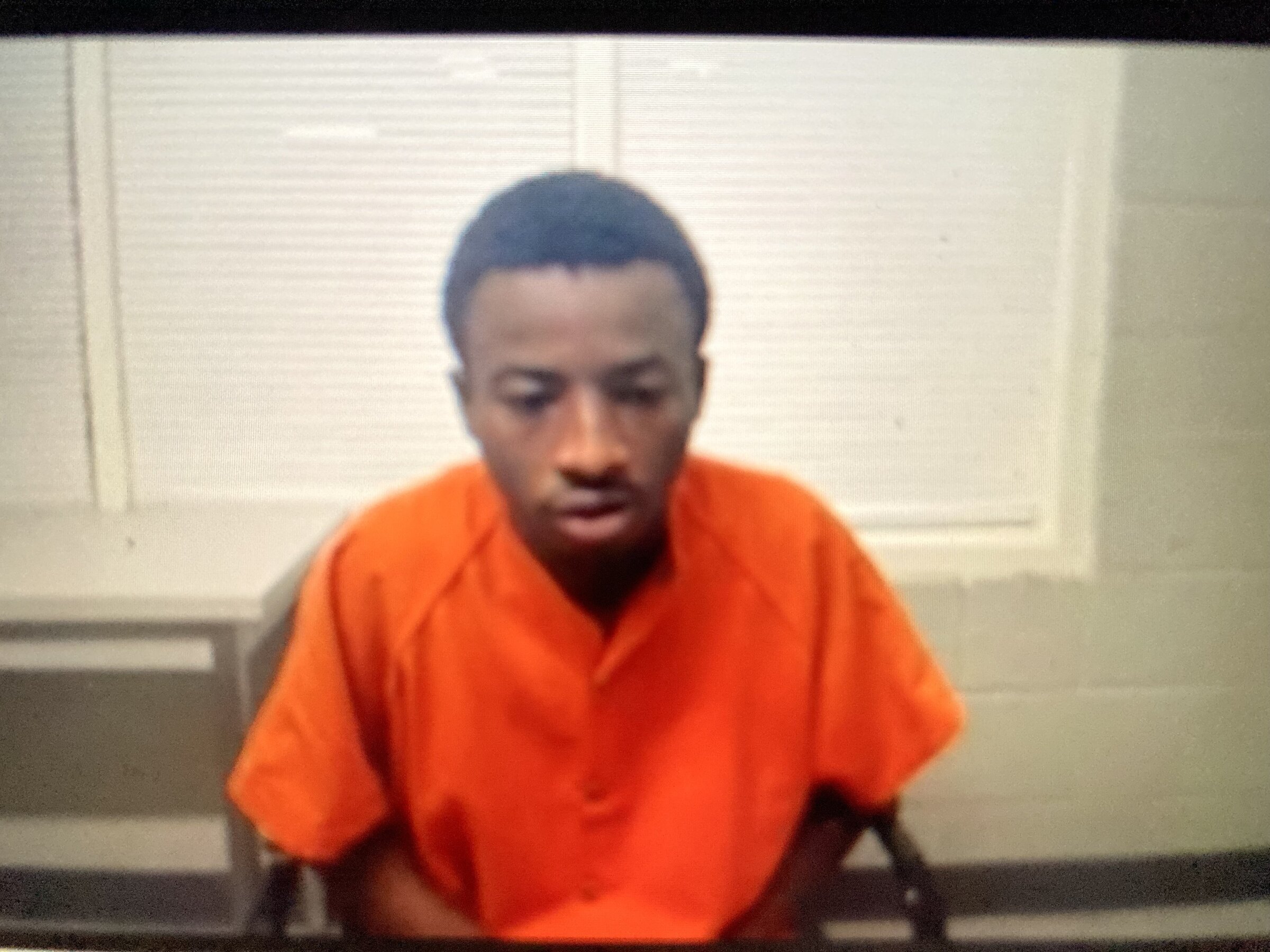 Man, 21, arrested in May killing