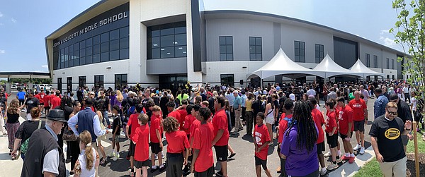 Fayetteville Superintendent John L Colbert addresses crowd at ribboncutting for namesake school