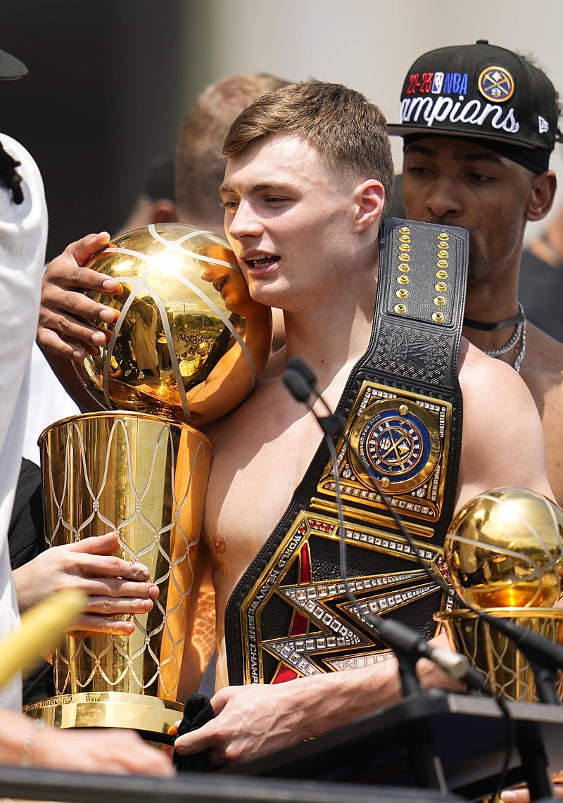 Denver Nuggets celebrate their first NBA title