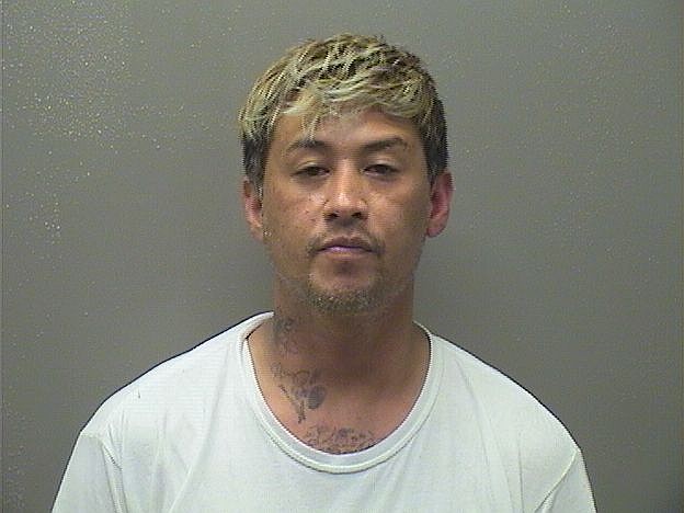 Man arrested after allegedly buying two cars from dealership with ...