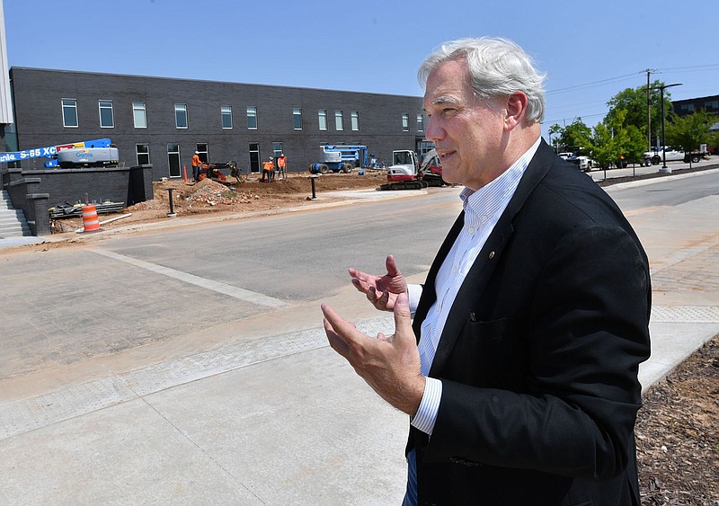 Roy Decker, architect with Duvall Decker in Jackson, Miss., speaks Thursday while leading a tour of Springdale's new administration building. Visit nwaonline.com/photo for todays photo gallery.

(NWA Democrat-Gazette/Andy Shupe)