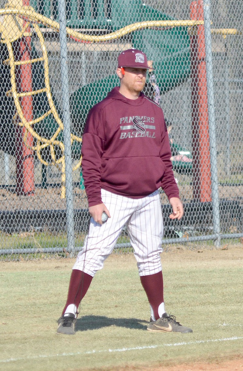 Graham Thomas/Herald-Leader
Siloam Springs' Michael Smith coaches third base against Alma during a game in the 2023 season. Smith was hired as head baseball coach during a school board meeting on June 13.