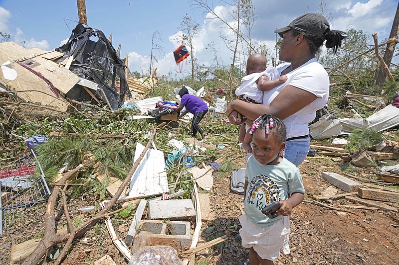 1 dead, nearly 2 dozen injured after multiple tornadoes sweep through