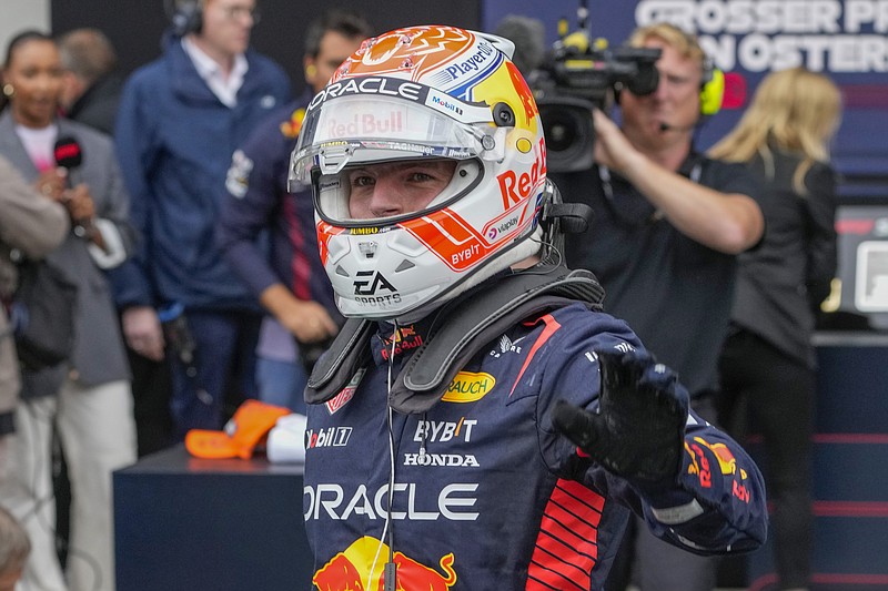 Red Bull driver Max Verstappen of the Netherlands celebrates winning the sprint race at the Red Bull Ring racetrack Saturday in Spielberg, Austria. - Photo by Darko Bandic of The Associated Press