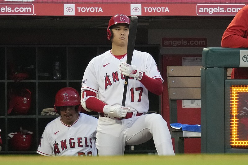 Shohei Ohtani of the Los Angeles Angels looks on from the dugout