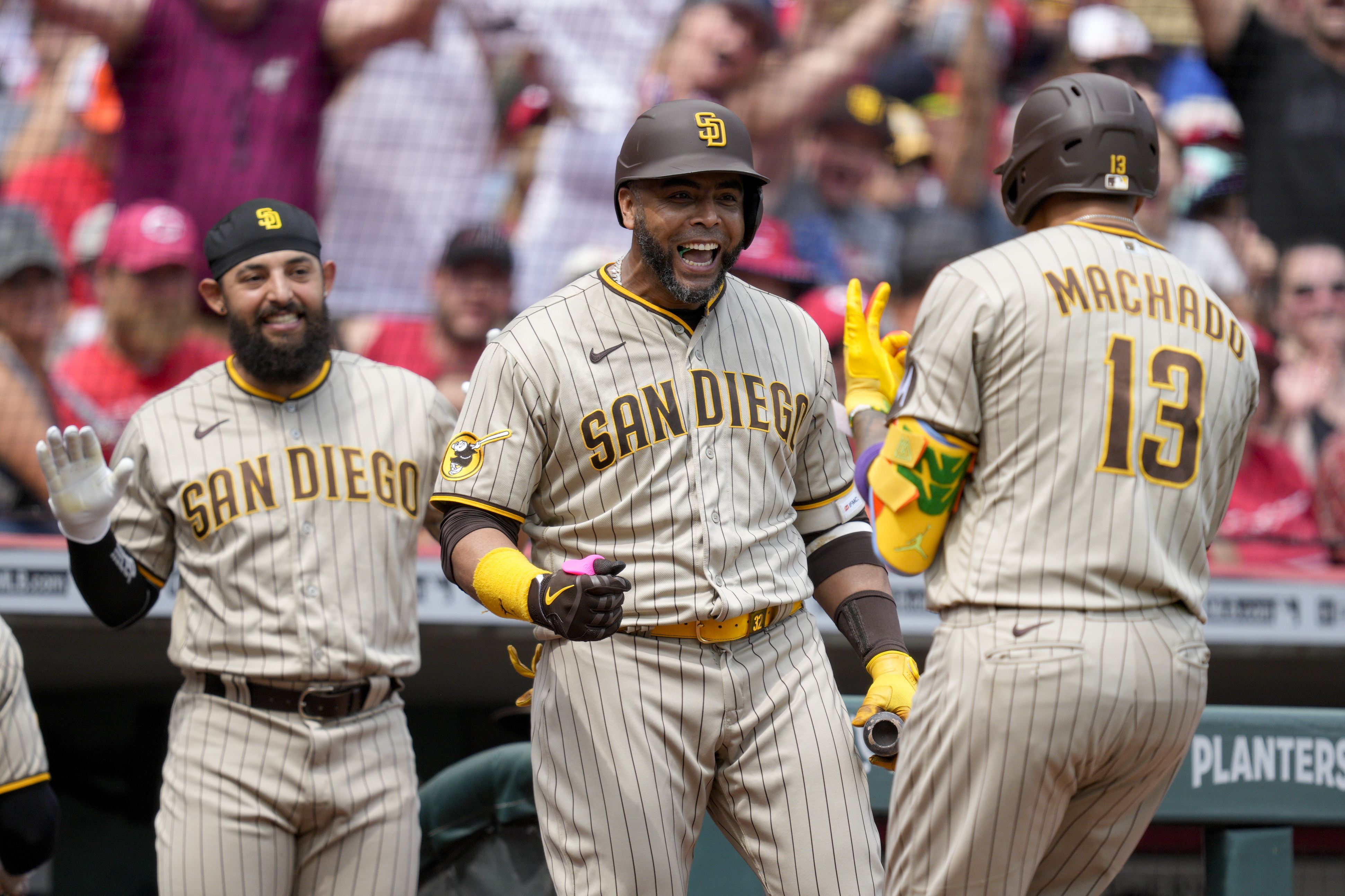 Manny Machado of the San Diego Padres celebrates after hitting an