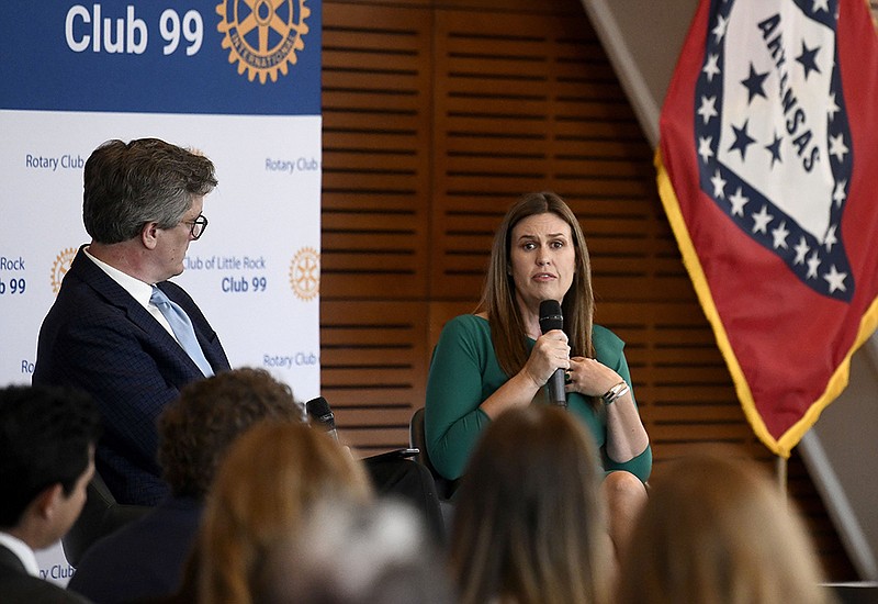 Arkansas Business Publishing Group Associate Publisher Chris Bahn, left, talks with Governor Sarah Huckabee Sanders during a question and answer session with the Little Rock Rotary Club focusing on her first six months in office as governor at the Clinton Center on Tuesday, July 18, 2023.

(Arkansas Democrat-Gazette/Stephen Swofford)