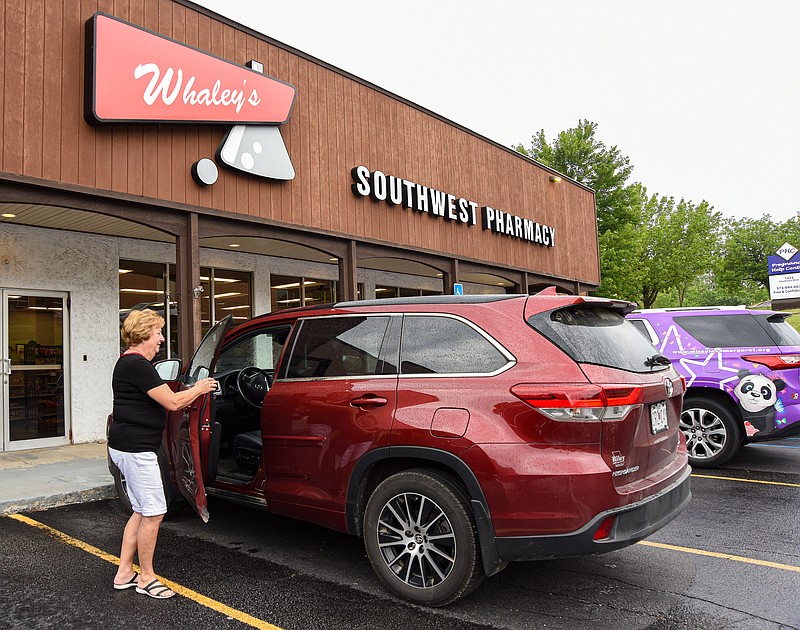 Julie Smith/News Tribune photo: 
Betty Parker prepares to leave the parking lot at Whaley's Friday, July 21, 2023, after picking up items at the Southwest Boulevard pharmacy. Parker has been a customer for quite awhile and said that she will miss the drugstore when it permanently closes Wednesday. Whaley's, has been locally owned for 80 years but the owner announced last week that the stores would be sold to national chain Walgreens.