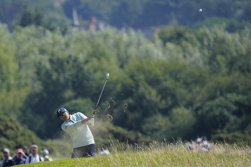United States' Rickie Fowler plays from 13th hole on the first day of the British Open Golf Championships at the Royal Liverpool Golf Club in Hoylake, England, Thursday, July 20, 2023. (AP Photo/Jon Super)