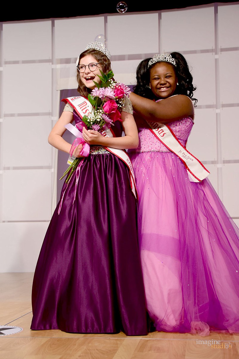 Submitted photo
Julianna Rogers of Bella Vista (left) smiles as she is crowned National American Miss Jr. Preteen Queen.