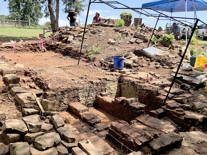 Denise Nemec Special to the Enterprise-Leader
An archaeological dig of the historic pottery kilns used by J.D. Wilbur has been going on at this site near Cane Hill by the University of Arkansas Archeological Research Station. This shows a groundhog kiln in the foregound and a higher hogback kiln in the background.