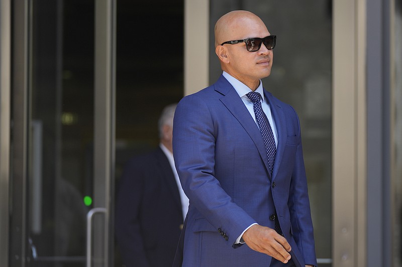 FILE - Walt Nauta, a valet to former President Donald Trump who is charged with helping the former president hide classified documents the Justice Department wanted back, leaves following his arraignment, at the James Lawrence King Federal Justice Building in Miami, July 6, 2023. (AP Photo/Rebecca Blackwell, File)