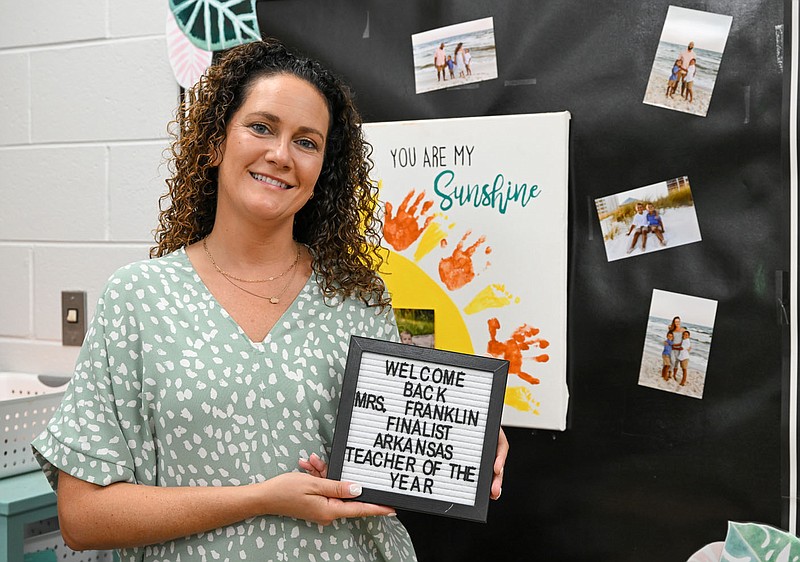 Nicole Franklin poses Friday in her classroom at Raymond Orr Elementary in Fort Smith. Franklin teaches English language arts and social studies and was named as a semi-finalist for State Teacher of the Year award. Visit nwaonline.com/photo for today's photo gallery.
(River Valley Democrat-Gazette/Caleb Grieger)