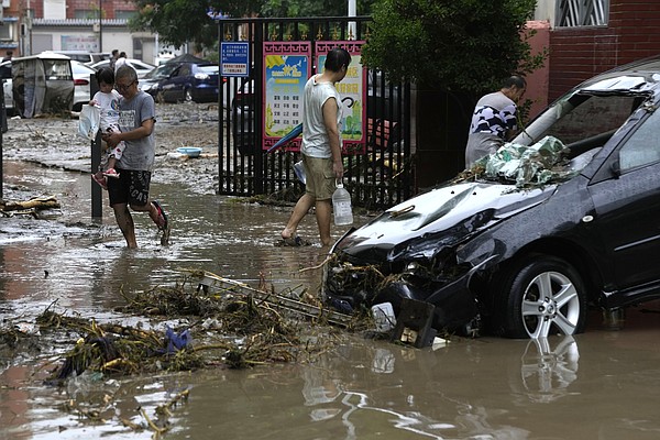 Floods In Chinese Capital Kill At Least 20, Leave 27 Missing As ...