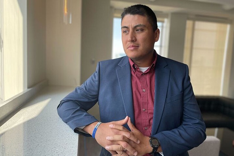 Former Northwestern University football player Ramon Diaz at his lawyers' office in Chicago on Wednesday, Aug. 2, 2023. Diaz's lawsuit alleges widespread hazing among athletes at the school in Evanston, Illinois. (AP Photo/Claire Savage)