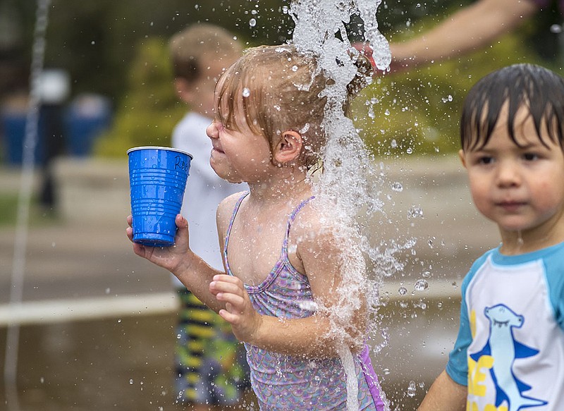 PHOTO GALLERY: Beating the heat, basketball mural and square dancing ...