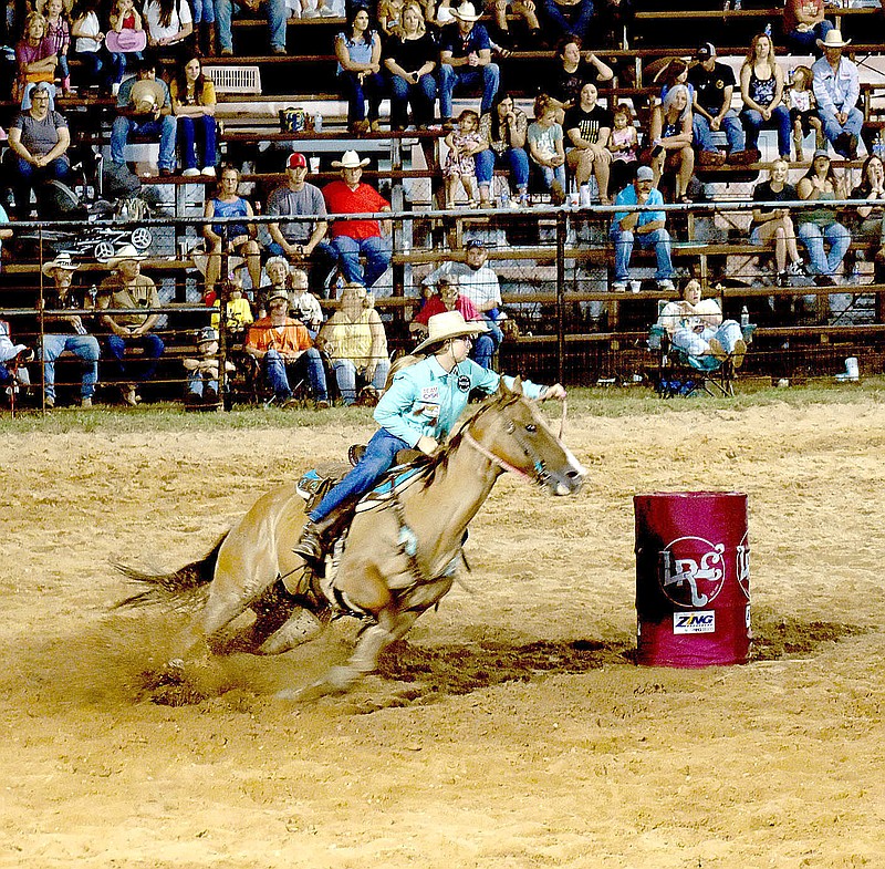 FILE PHOTO
Mallory McGee, of Farmington, competes in barrel racing during the 69th annual Lincoln Riding Club Rodeo in 2022. The rodeo opens today (Aug. 9) with the popular street dance on Lincoln Square and continues through Saturday night. See the schedule for the 70th annual Lincoln Rodeo on Page 5A.