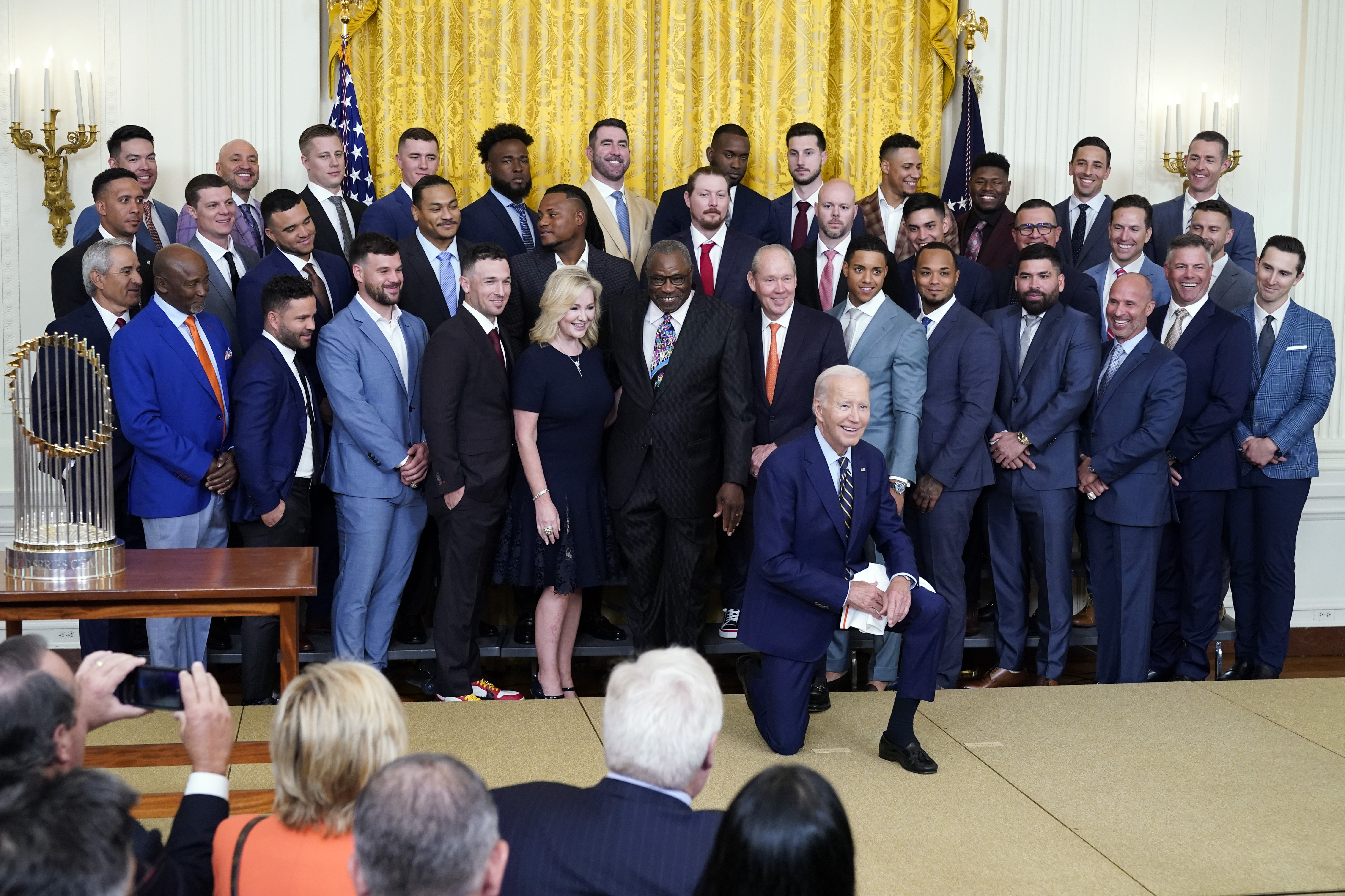 Houston Astros owner Jim Crane and Houston Astros manager Dusty Baker Jr.,  right, present a jersey to President Joe Biden during an event celebrating  the 2022 World Series champion Houston Astros baseball