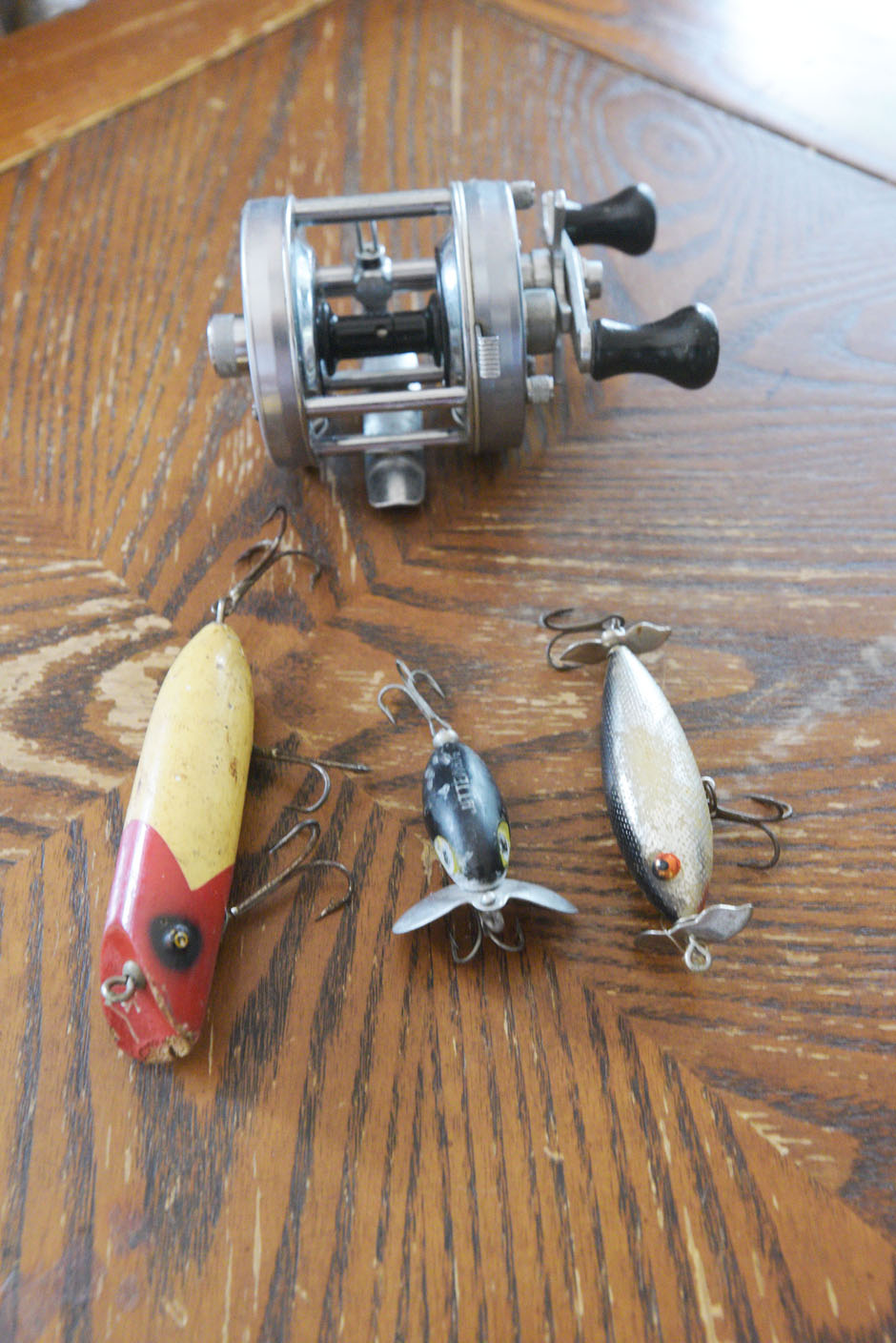 A vintage Fred Arbogast Jitterbug fishing lure with the original box and  fishing hints paper. - Antique Mystique
