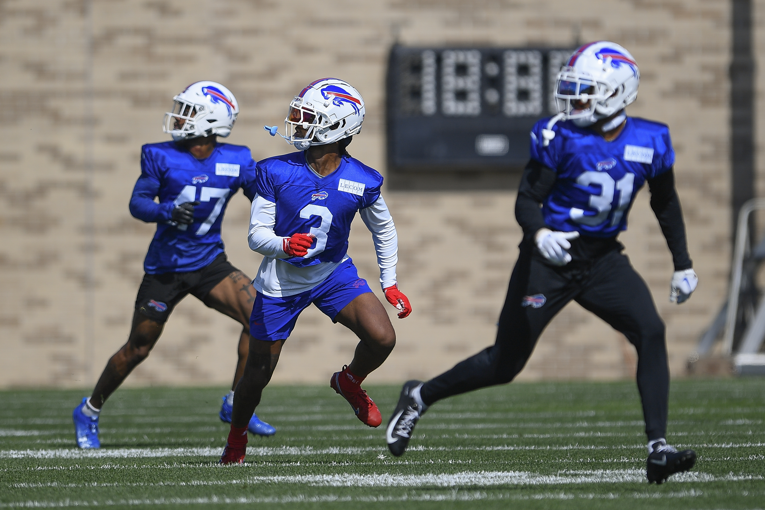 Buffalo Bills strong safety Micah Hyde, right, exchanges jersey's