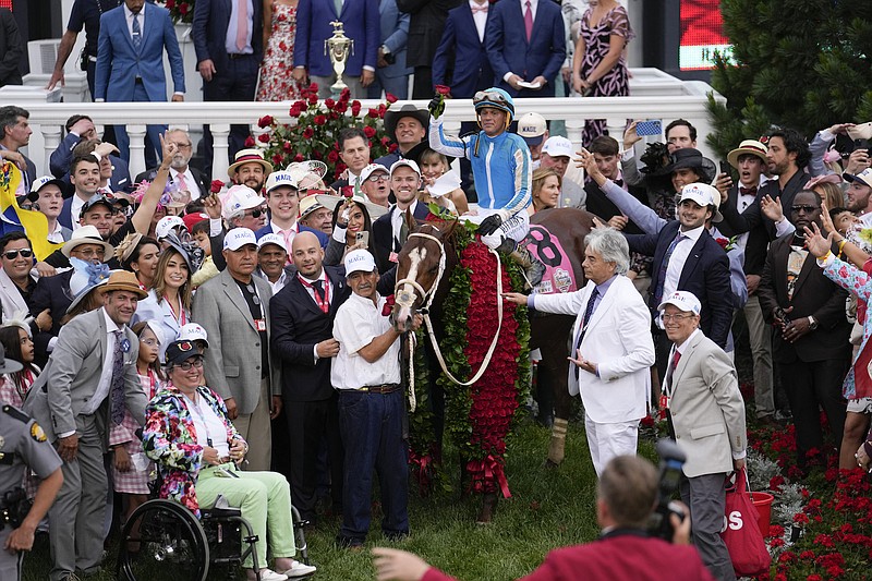 Javier Castellano, atop Mage, reacts in the winner's circle after winning the 149th running of the Kentucky Derby at Churchill Downs May 6 in Louisville, Ky. - Photo by Jeff Roberson of The Associated Press